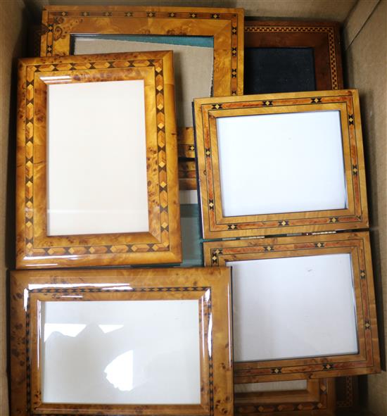 Six inlaid style wooden photograph frames and two other frames
